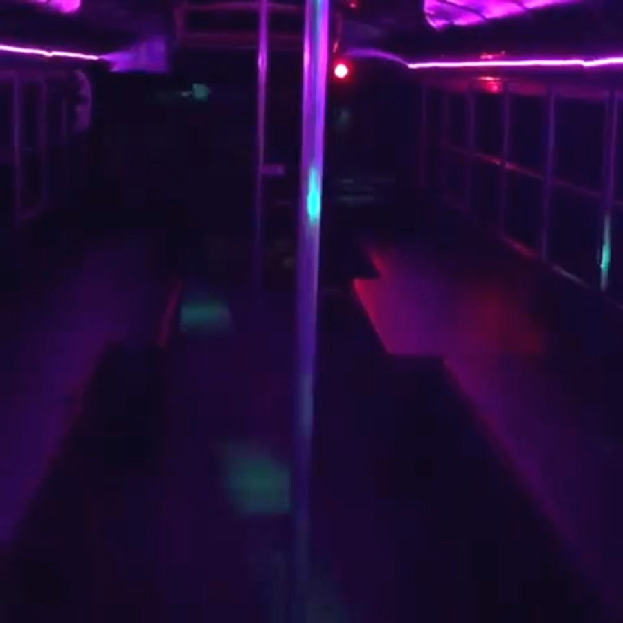 Purple party lighting inside Nene's Party Bus