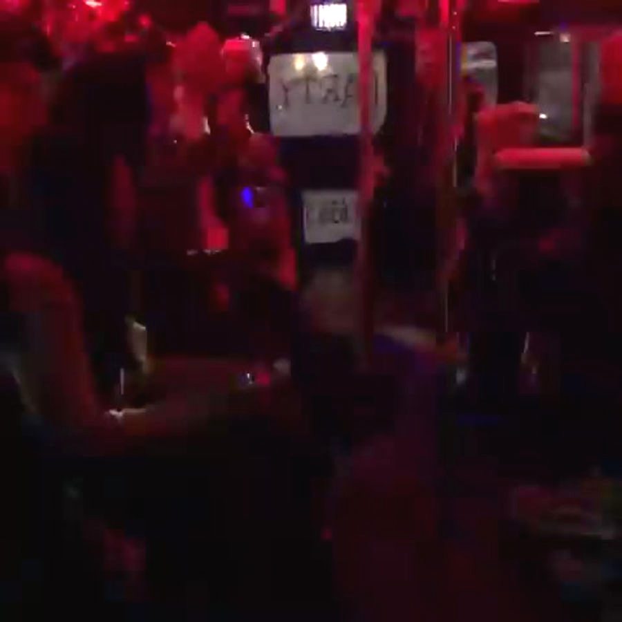 Red party lighting inside Nene's Party Bus